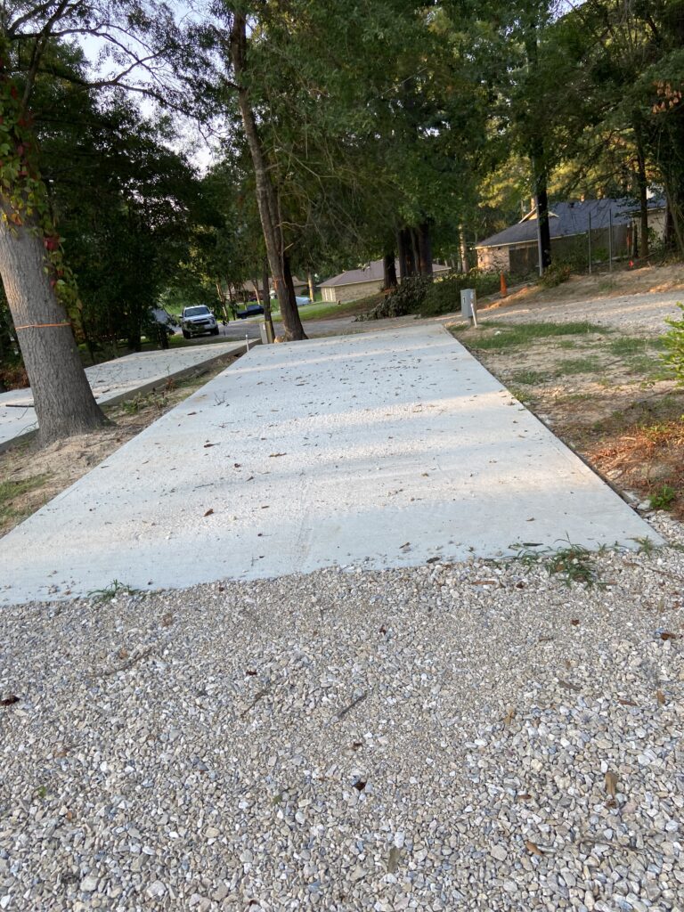 RV spot 1 with 50/30 amp hookups, sewer, and water on 12x35 concrete pad