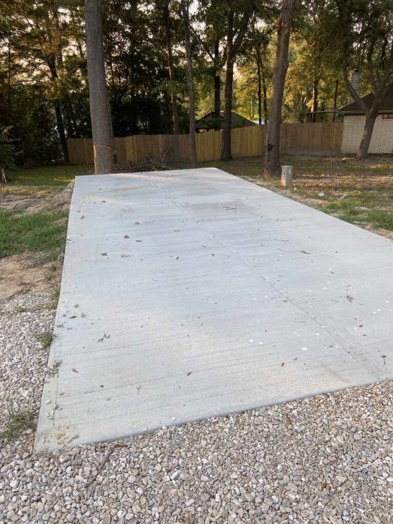 RV spot 4 with 50/30 amp hookups, sewer, and water on 12x30 concrete pad