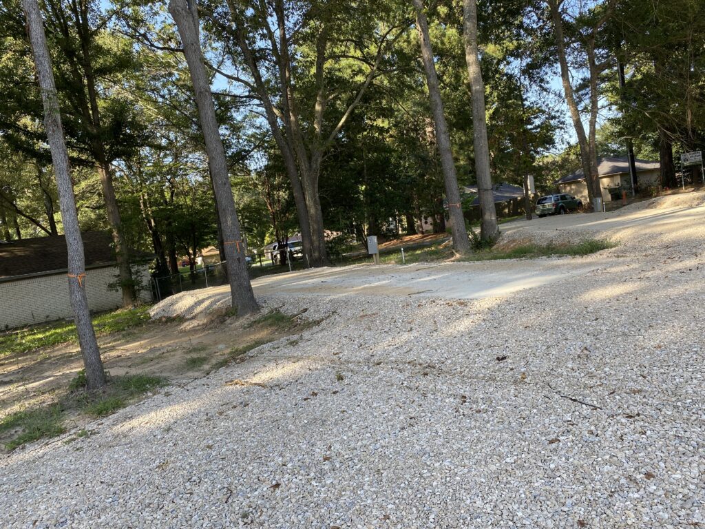 RV spot 3 with 50/30 amp hookups, sewer, and water on 12x32 concrete pad