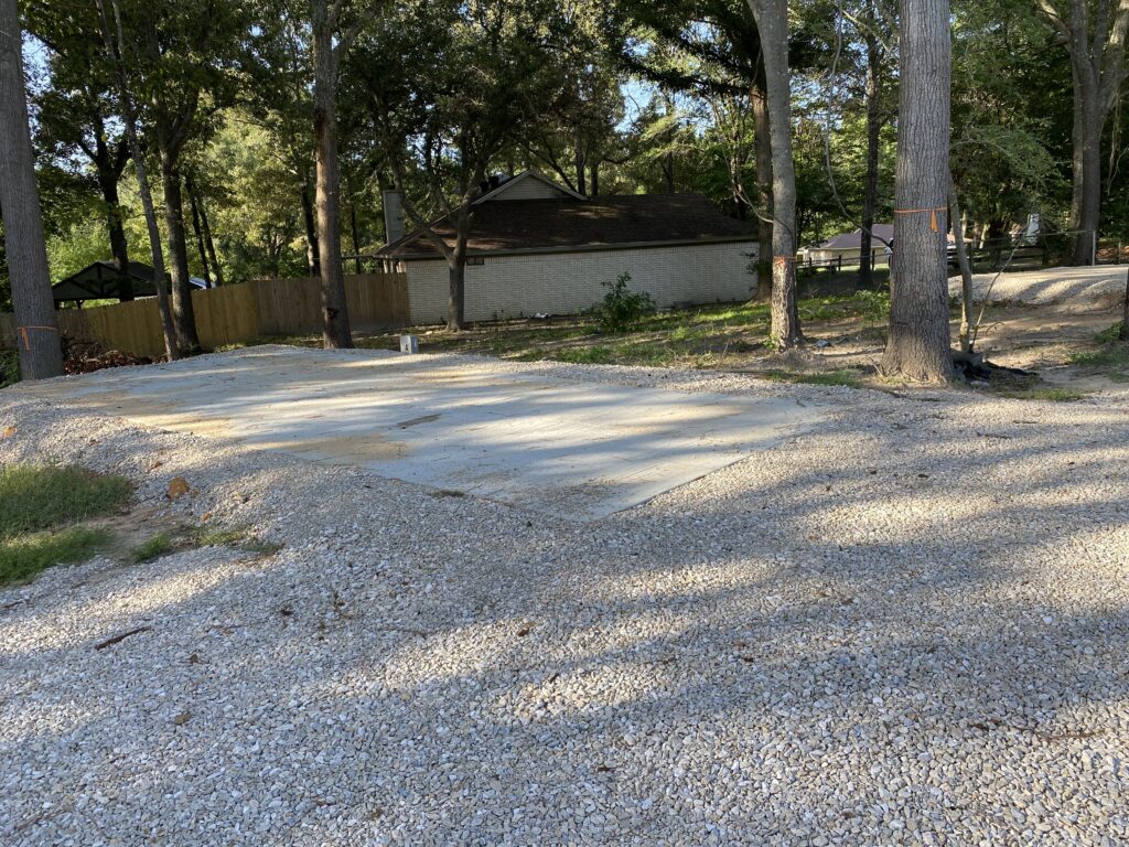 RV spot 4 with 50/30 amp hookups, sewer, and water on 12x30 concrete pad