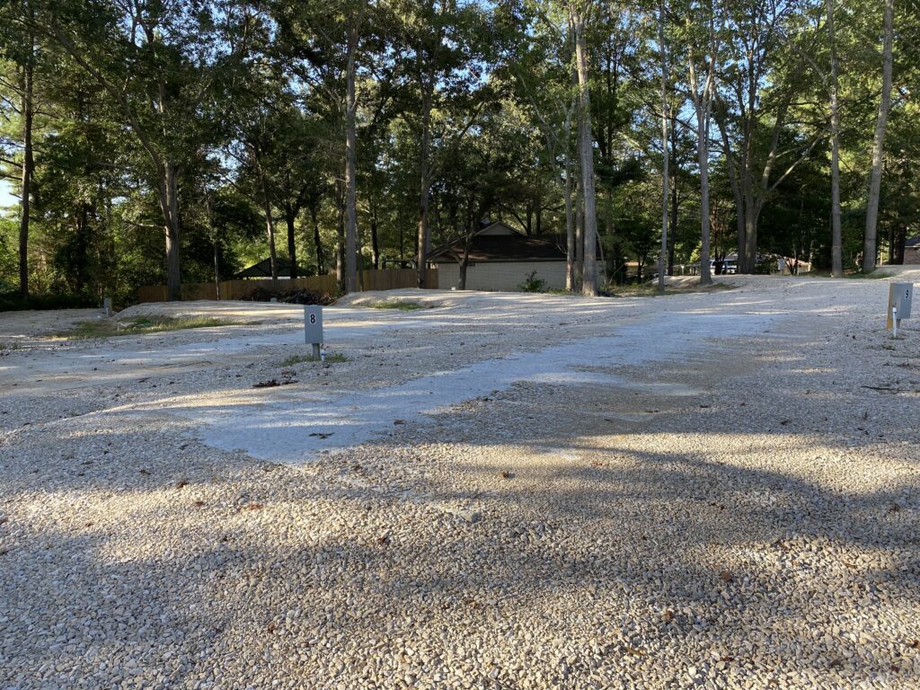 RV spot 8 with 50/30 amp hookups, sewer, and water on 12x39 concrete pad